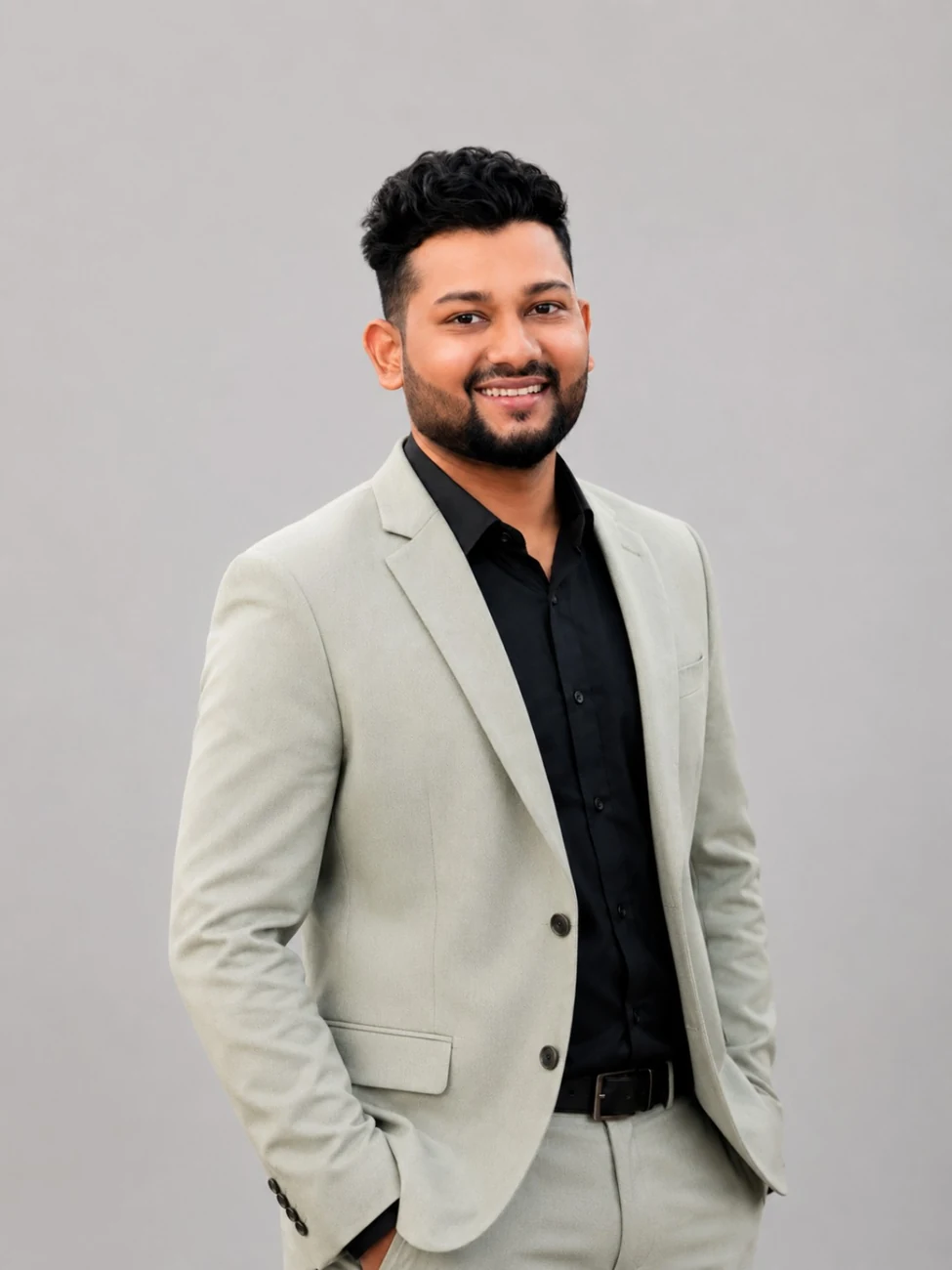 Pramod Kumar Jena in a light blazer and black shirt